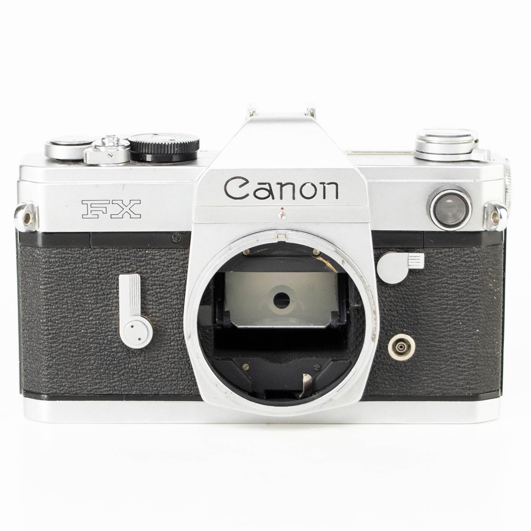 Canon FX Camera | Canon FL 50mm f1.8 lens | White | Japan | FD mount |