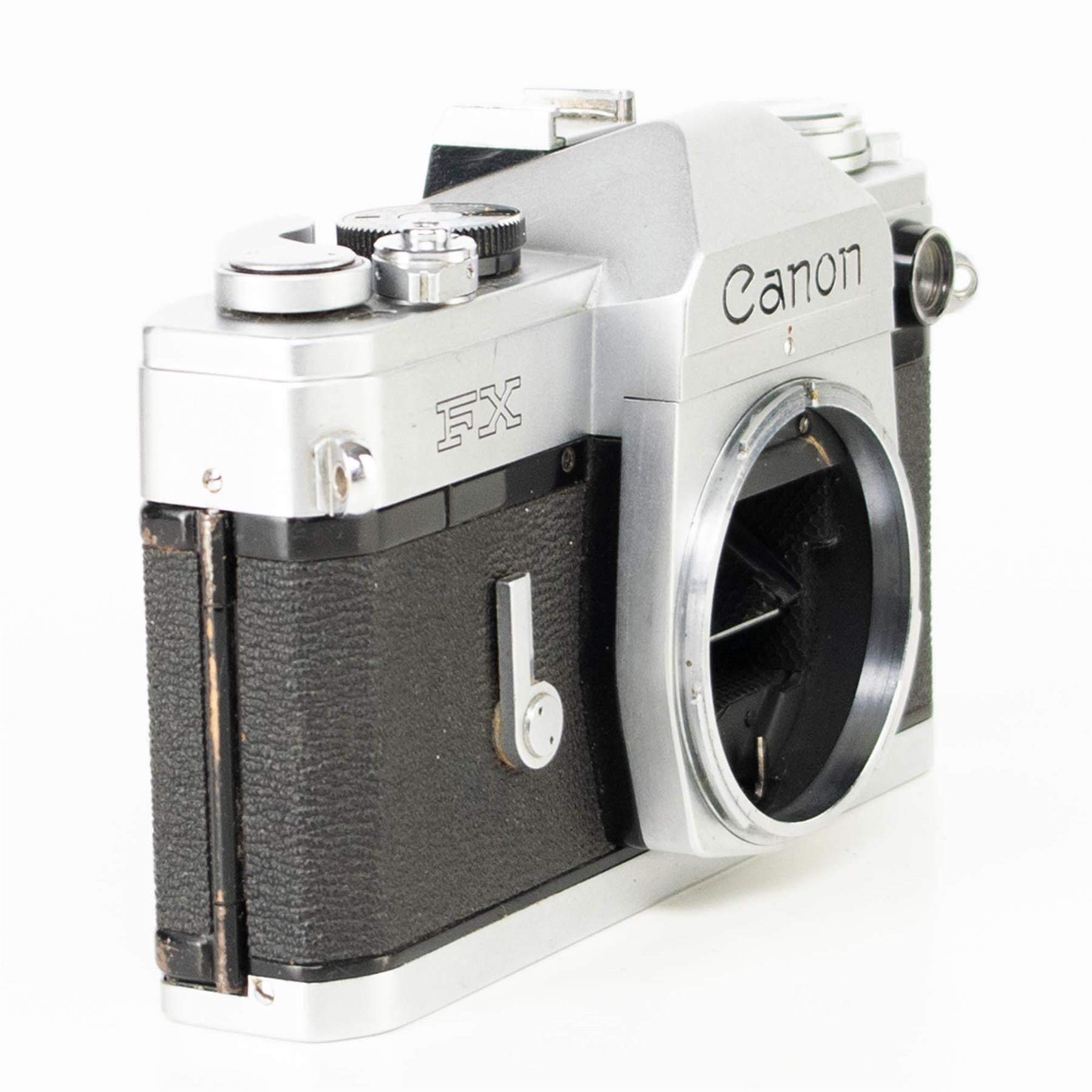 Canon FX Camera | Canon FL 50mm f1.8 lens | White | Japan | FD mount |