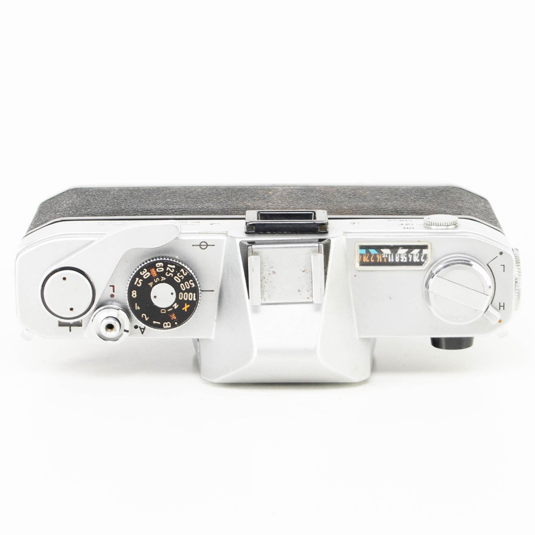 Canon FX Camera | Canon FL 50mm f1.8 lens | White | Japan | FD mount |