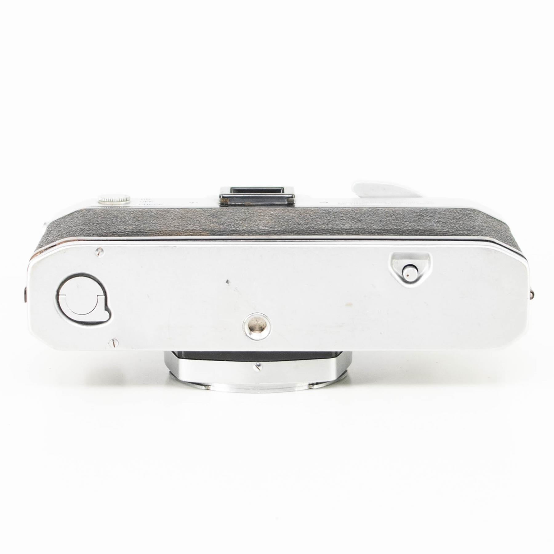 Canon FX Camera | Canon FL 50mm f1.8 lens | White | Japan | FD mount |
