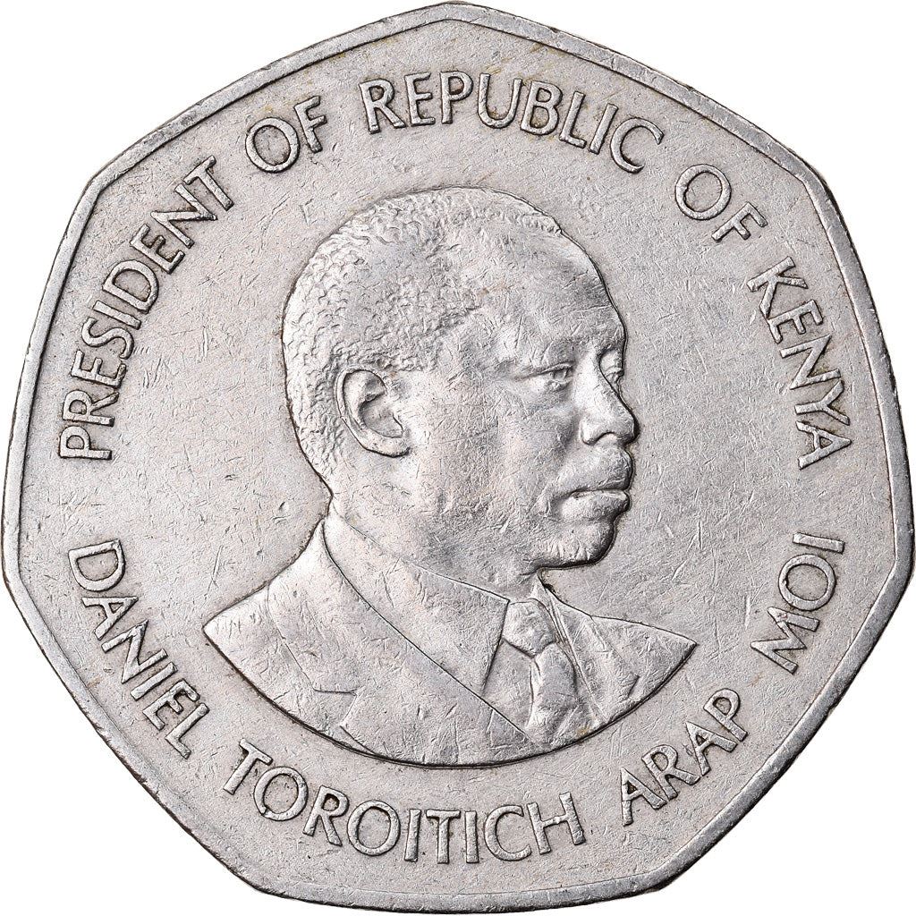 Quénia 5 xelins | Escudo | Machado | Leão | Pássaro | Moeda de Lança | KM23 | 1985